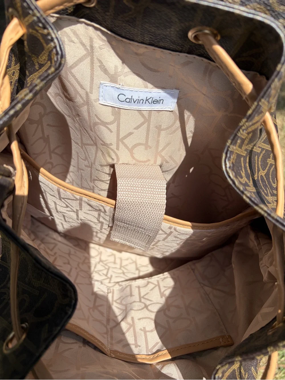 Calvin Klein Brown Monogram Canvas Backpack with Tan Trim